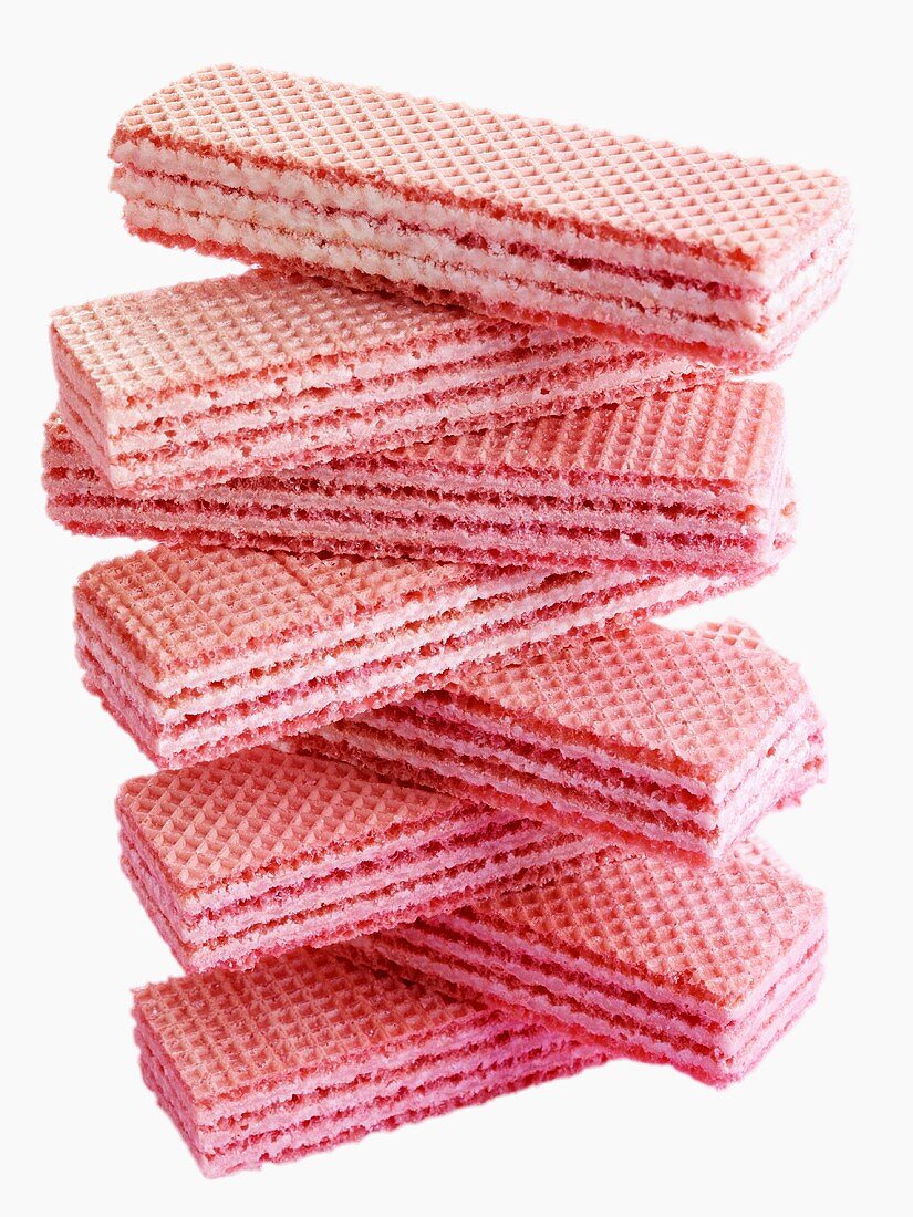 Pink wafer sandwich biscuits, in a pile