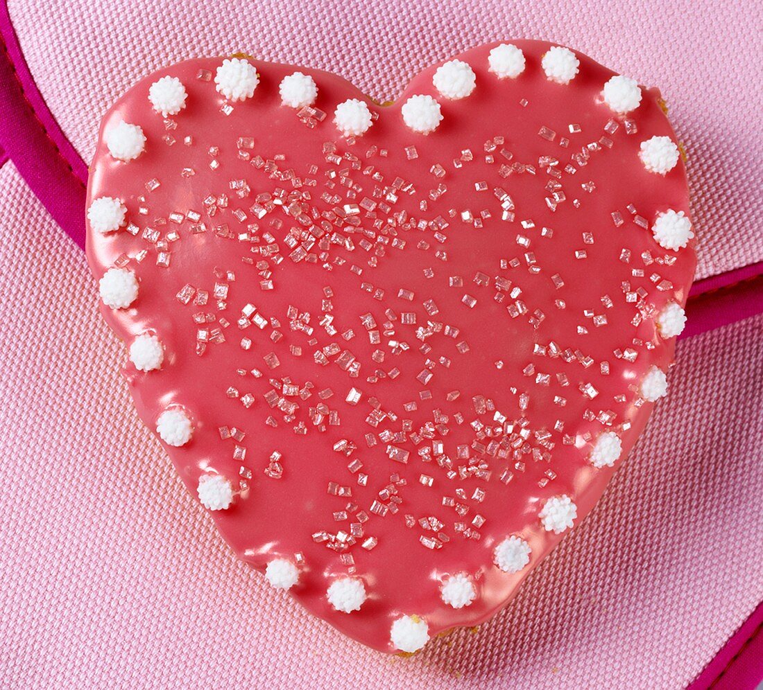 Heart-shaped cake with pink icing