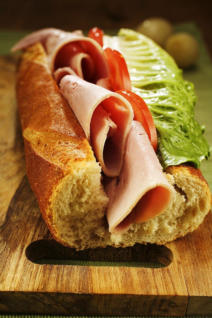 Ham, tomato and lettuce sandwich