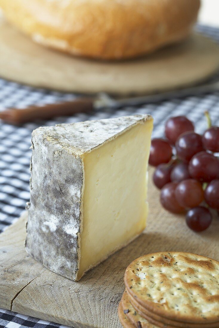 Gorwydd Caerphilly cheese from Wales with crackers & grapes