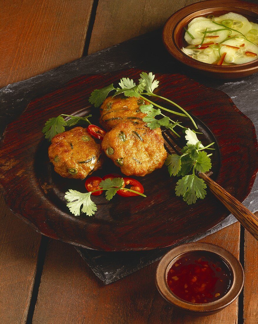 Tod Mun Pla (Thai fish cakes) with a cucumber salad