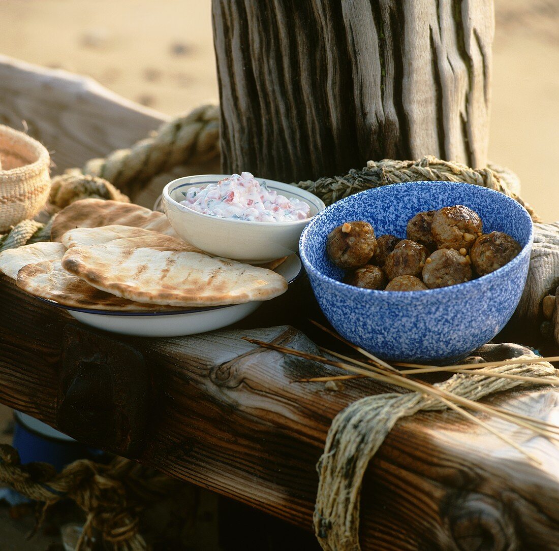 Lamb kofta with flat bread and a yogurt dip