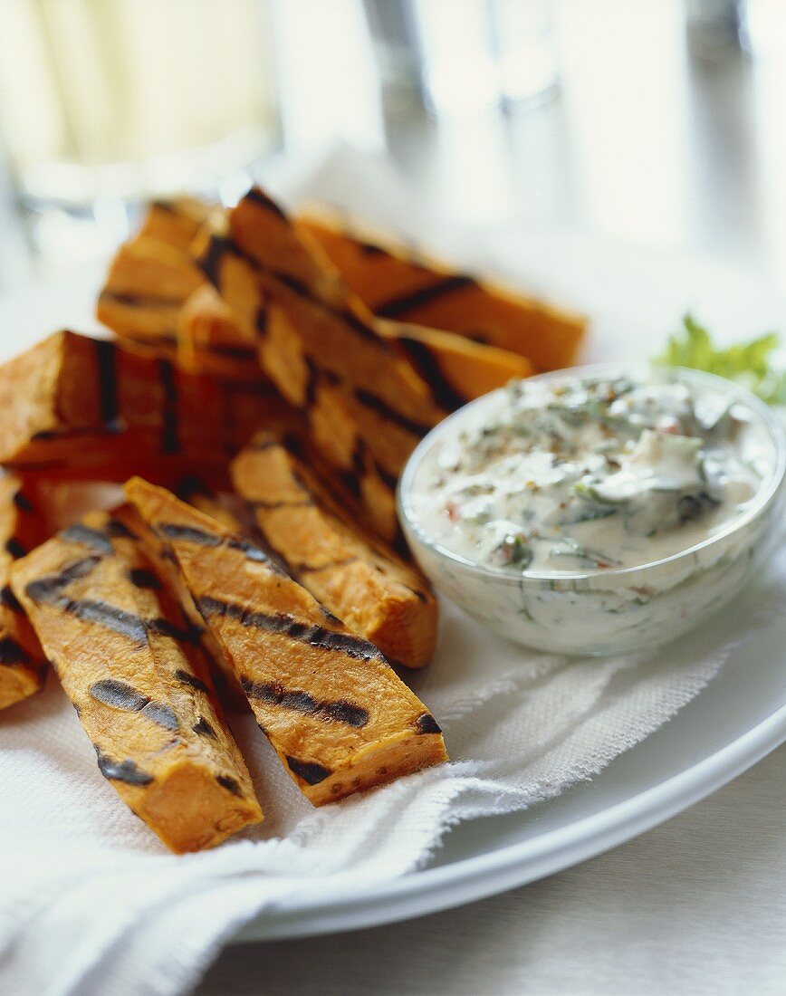 Grilled sweet potato sticks with a dip