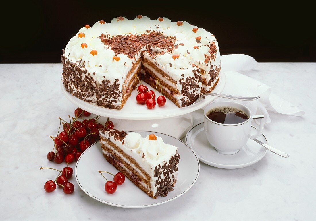 Black Forest cherry gateau and cup of coffee