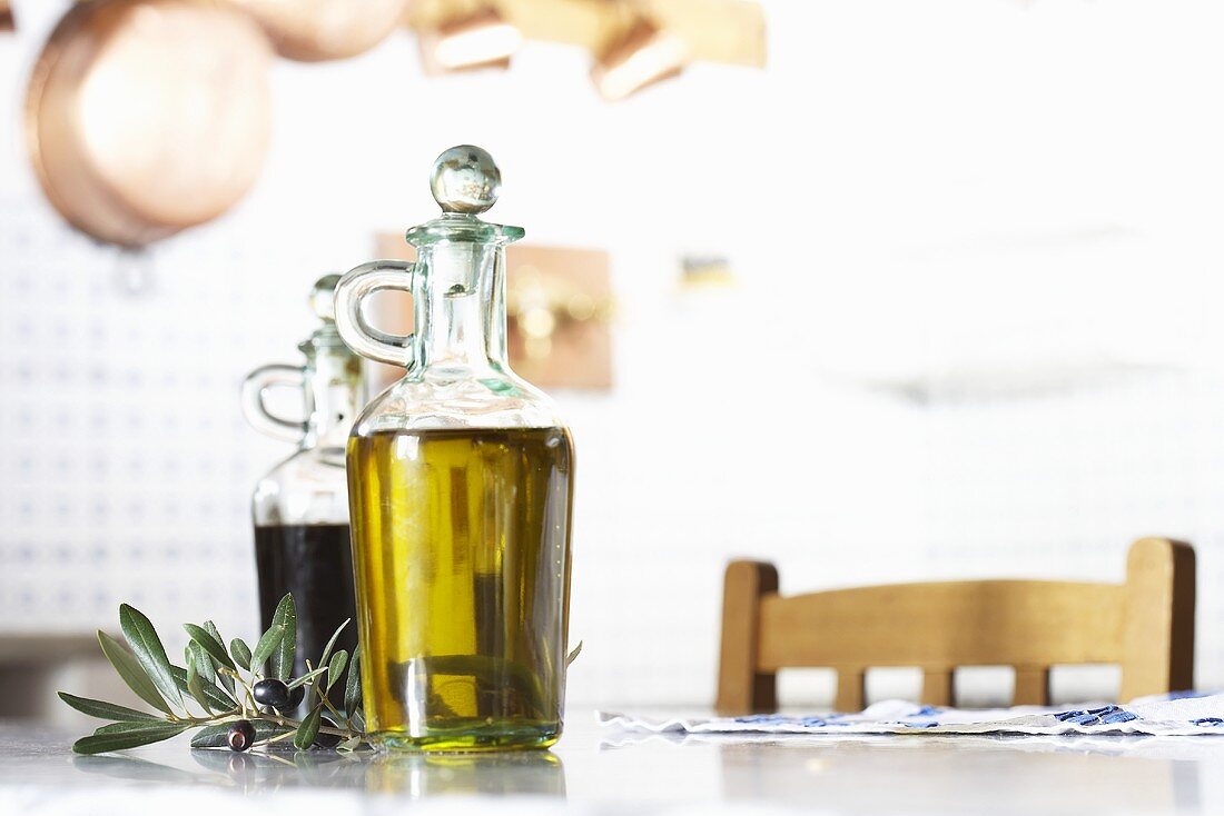 Olive oil and vinegar in glass jugs