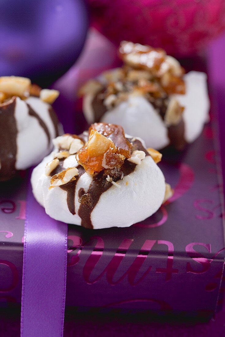 Meringues with nut brittle and chocolate for Christmas