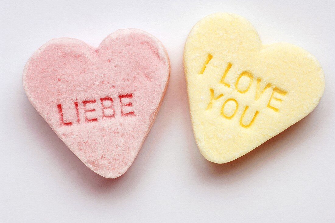 Two peppermint hearts with the words LIEBE (love) & I LOVE YOU