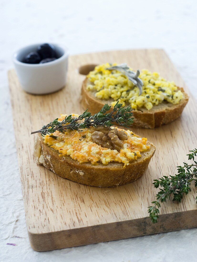 Two different egg spreads on bread