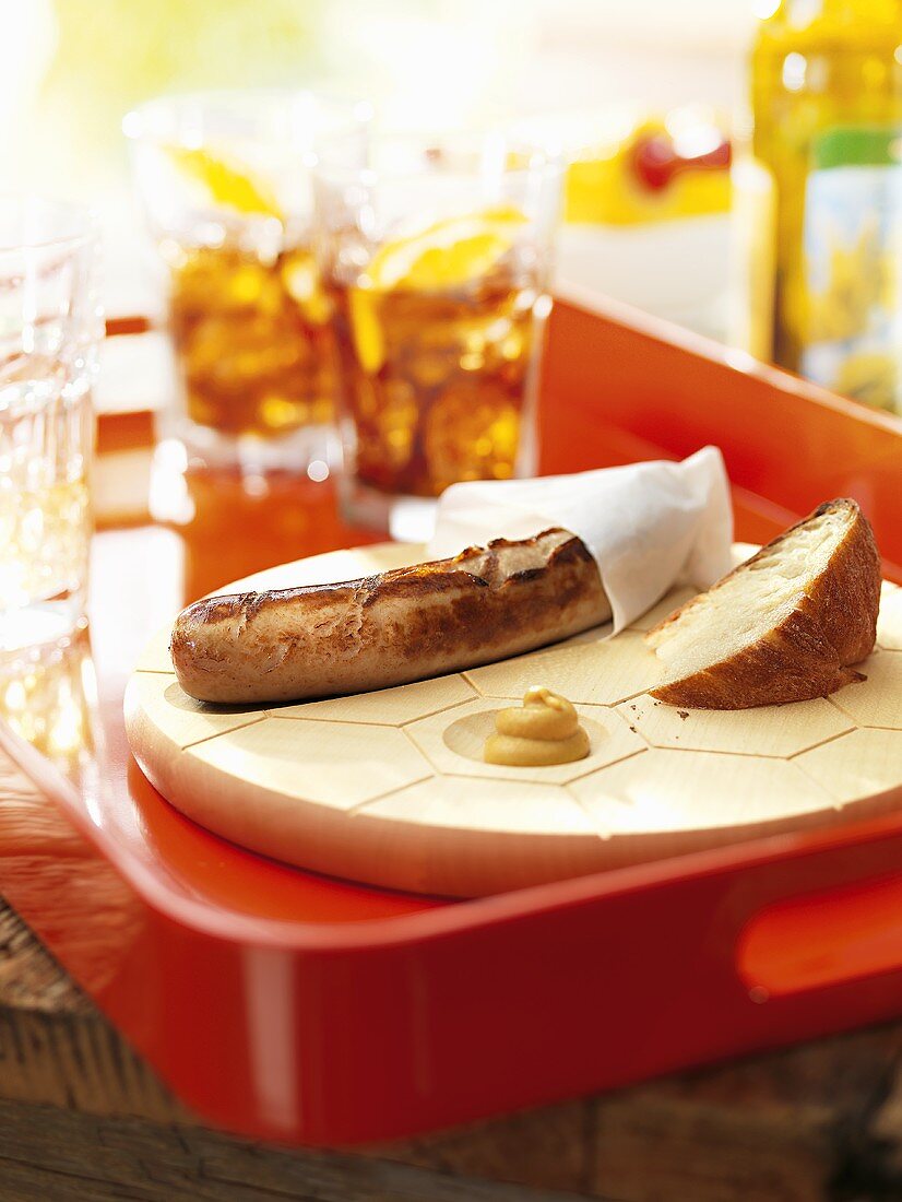 Sausage with bread and mustard