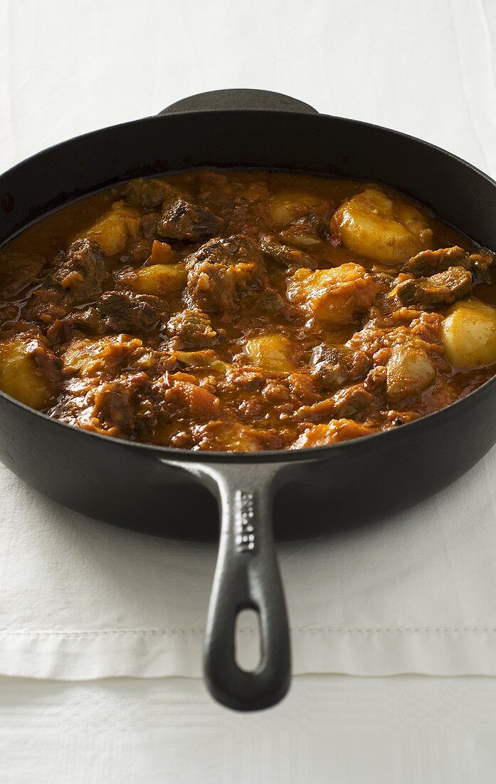 Beef stew in a frying pan