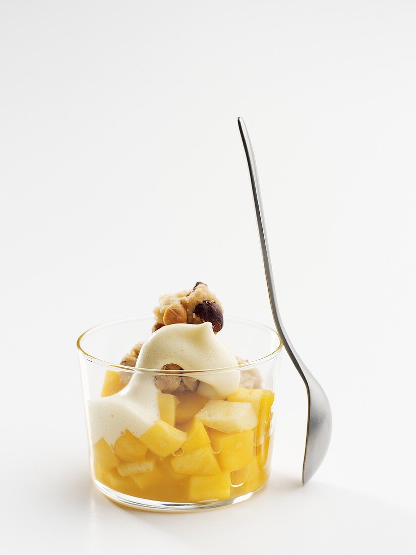 Pineapple compote with cream and nuts