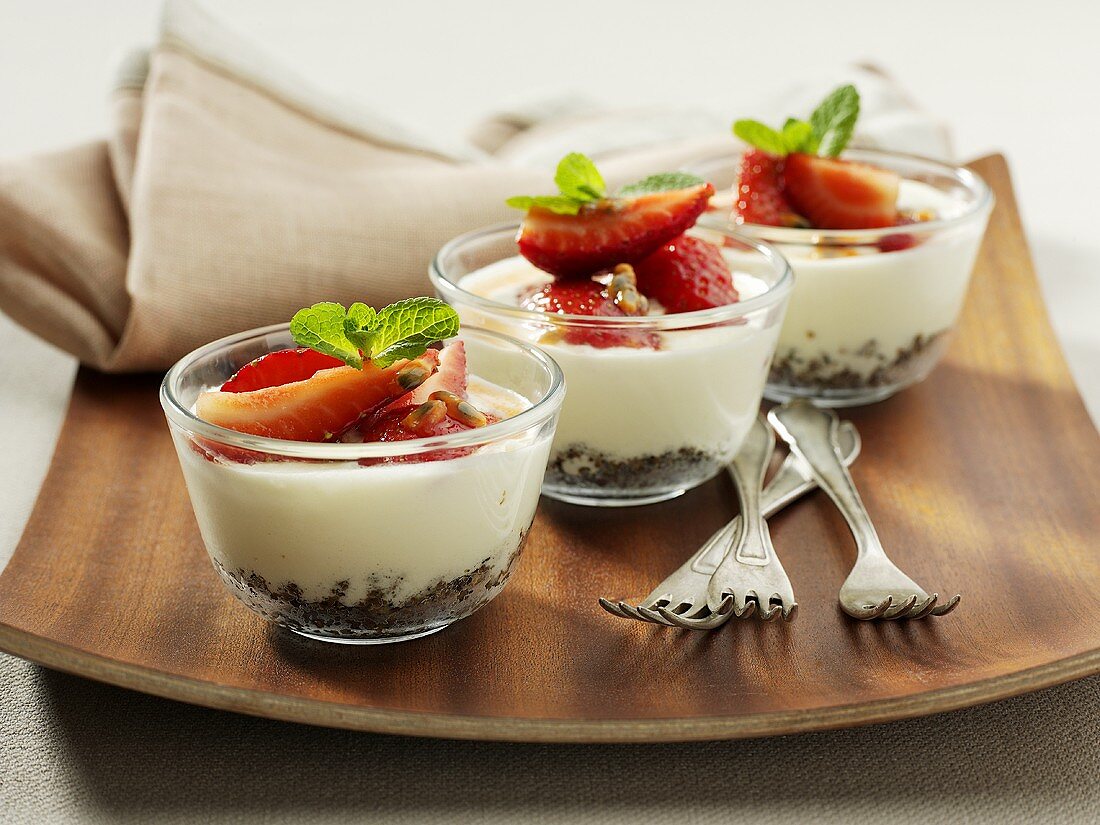 Panna cotta with strawberries in three bowls