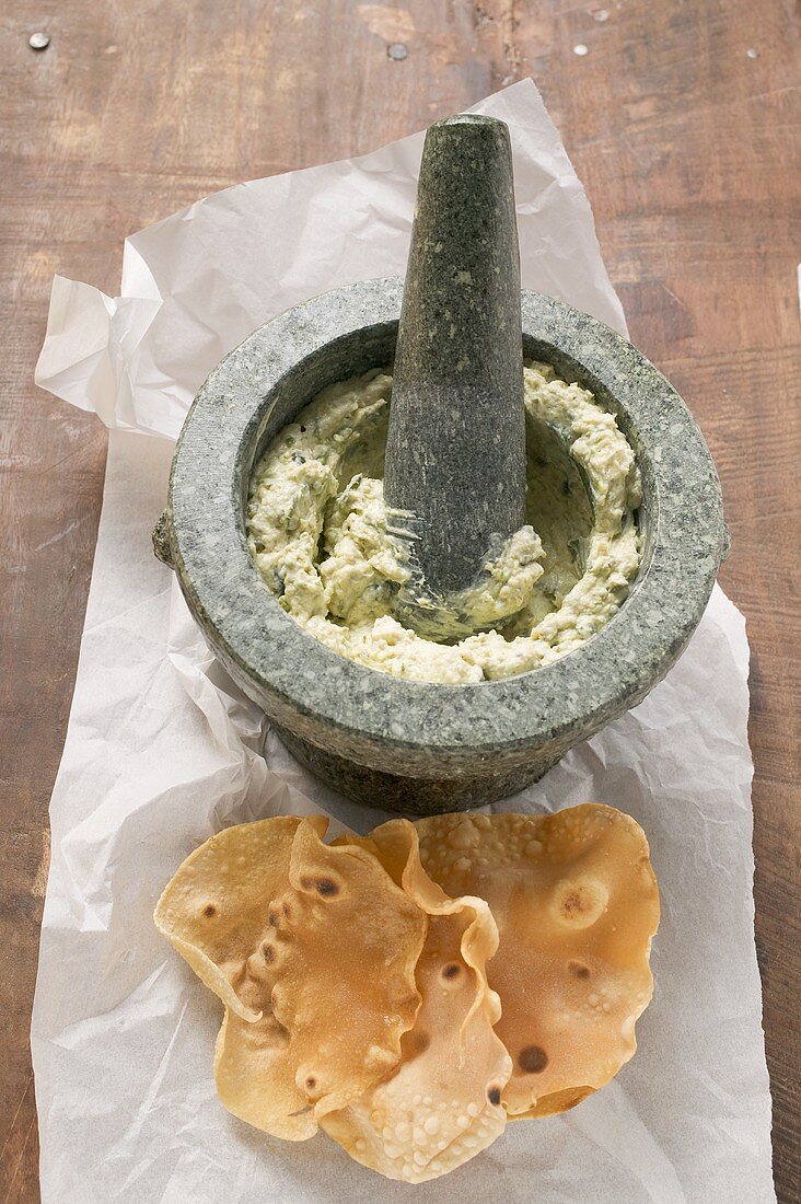 Ricotta spread with pistachios and mint, with poppadom