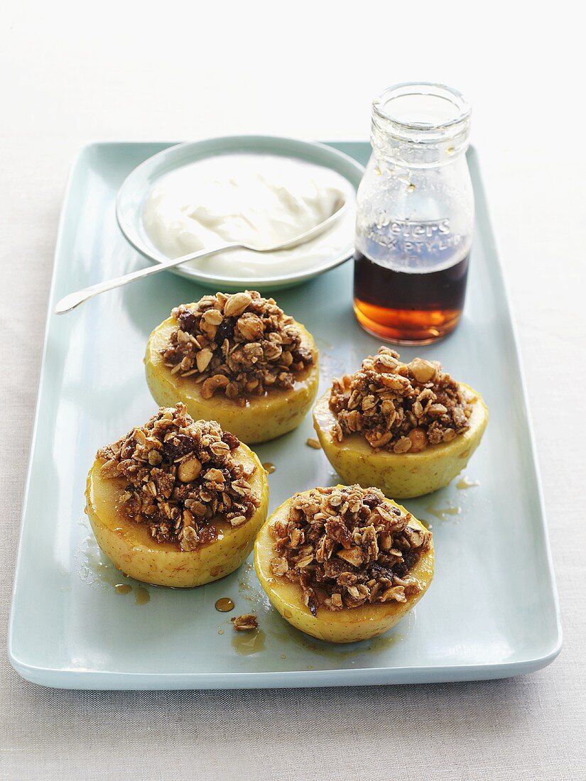 Stuffed baked apples, cream and maple syrup