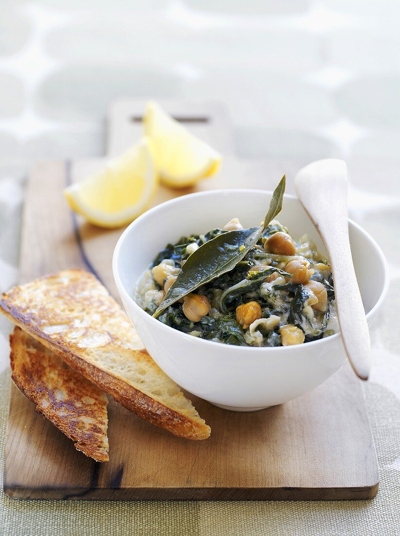 Goat's cheese with chard and chick-peas served with toast