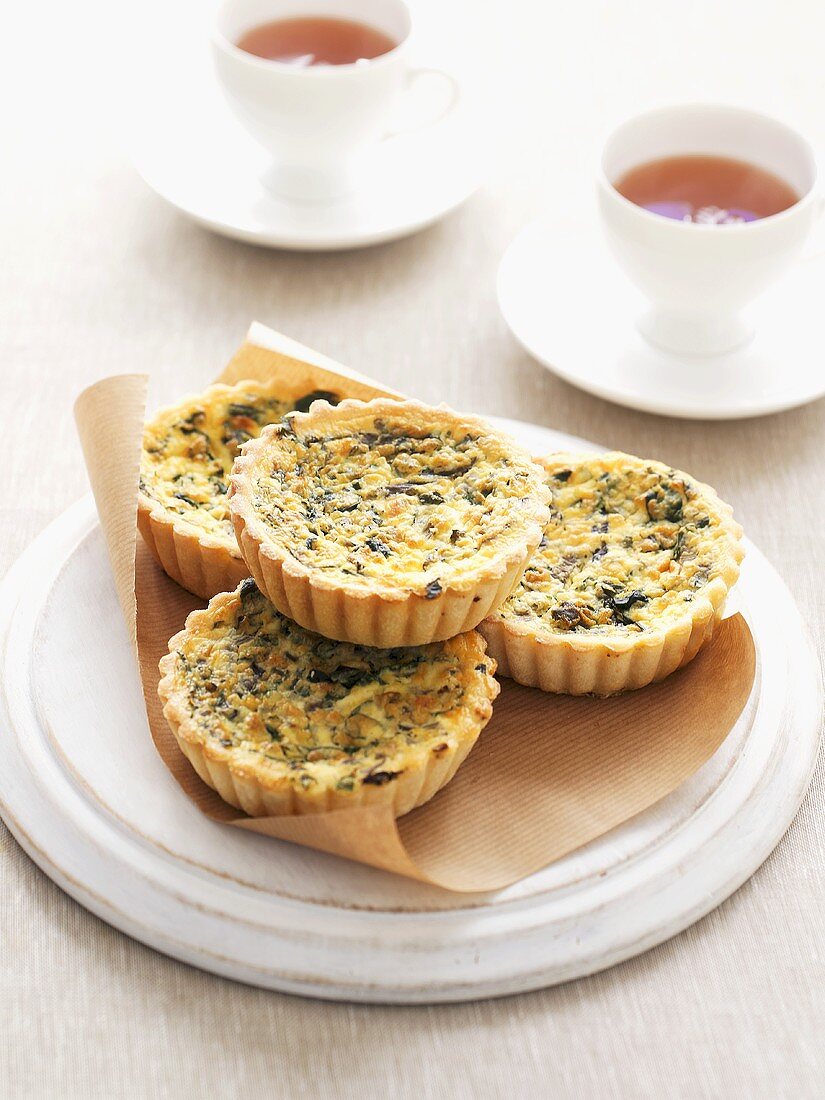 Individual spinach quiches