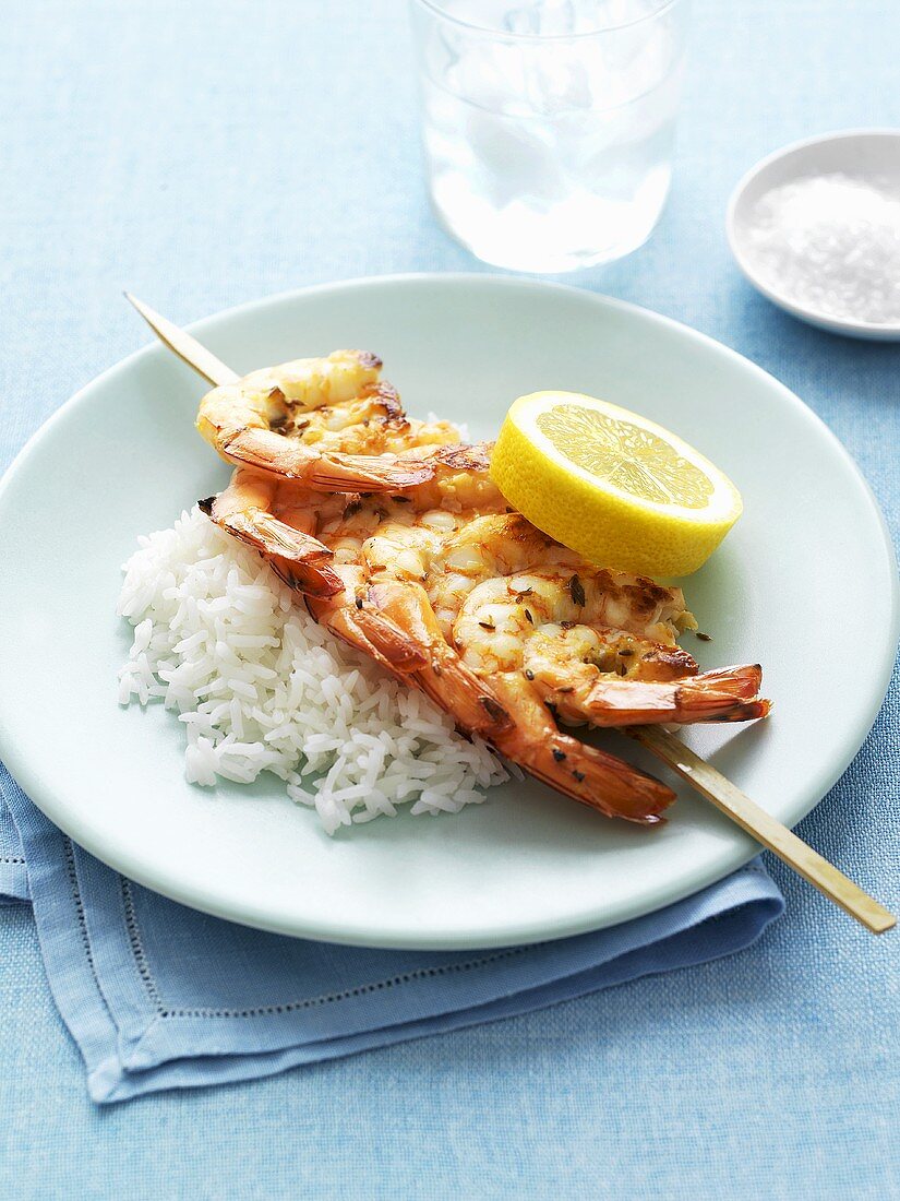 Grilled lemon and garlic prawns with rice