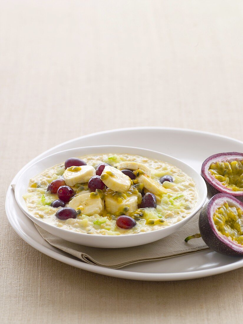 Bircher muesli with bananas, grapes and passion fruit