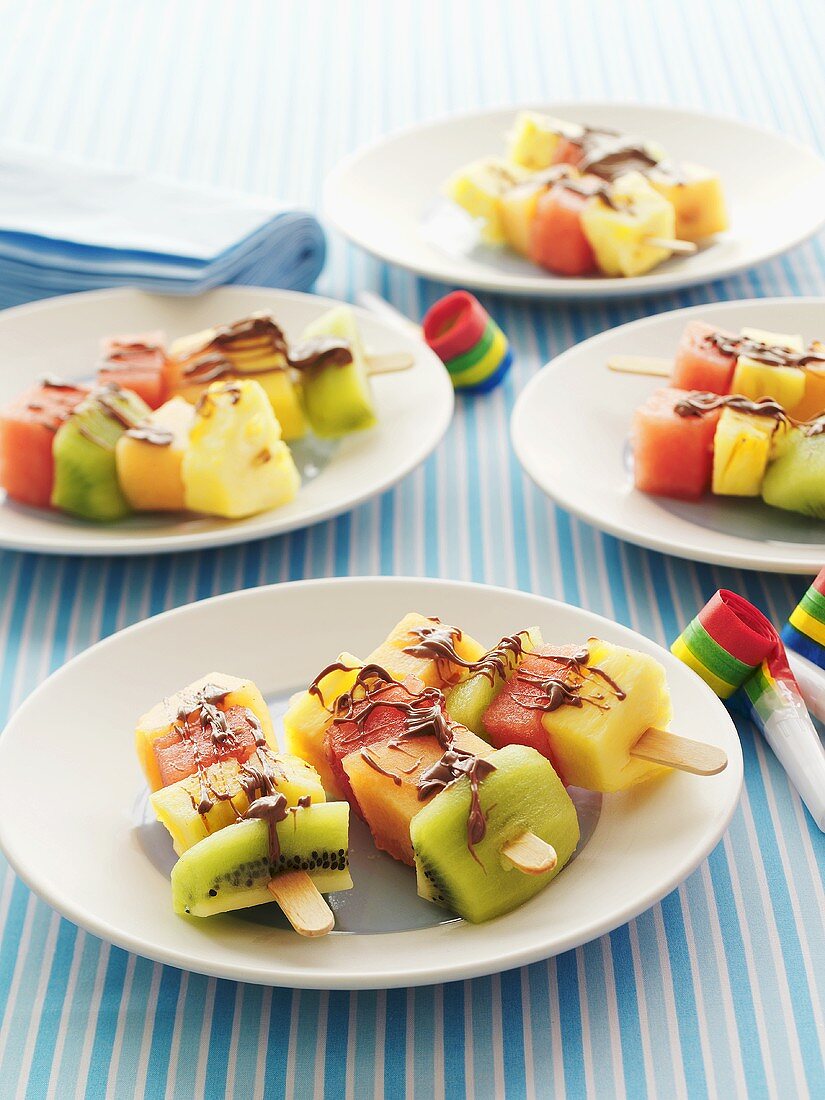 Fruit kebabs with chocolate sauce