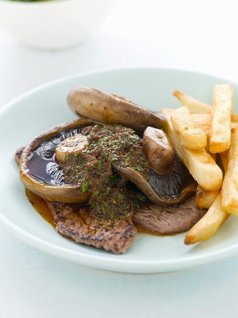 Beef fillet with Portobello mushrooms, chermoula and chips