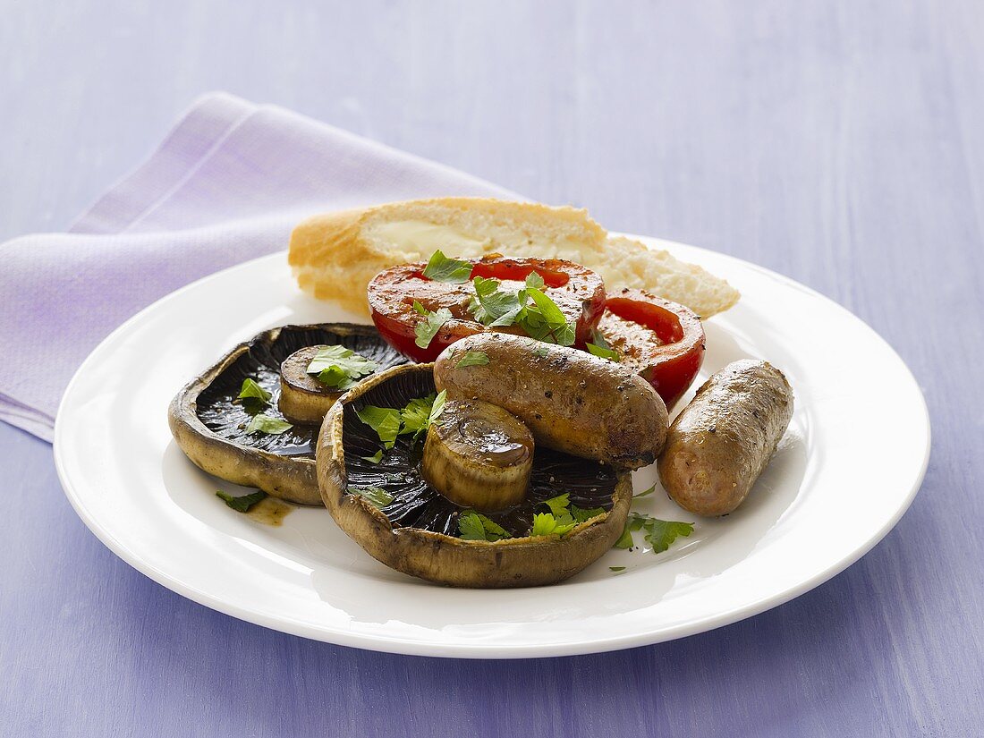 English breakfast with sausages and mushrooms