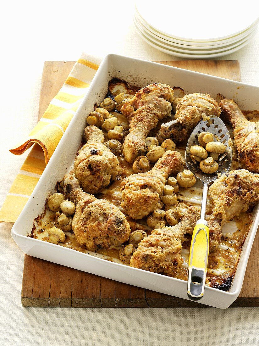 Chicken legs with button mushrooms