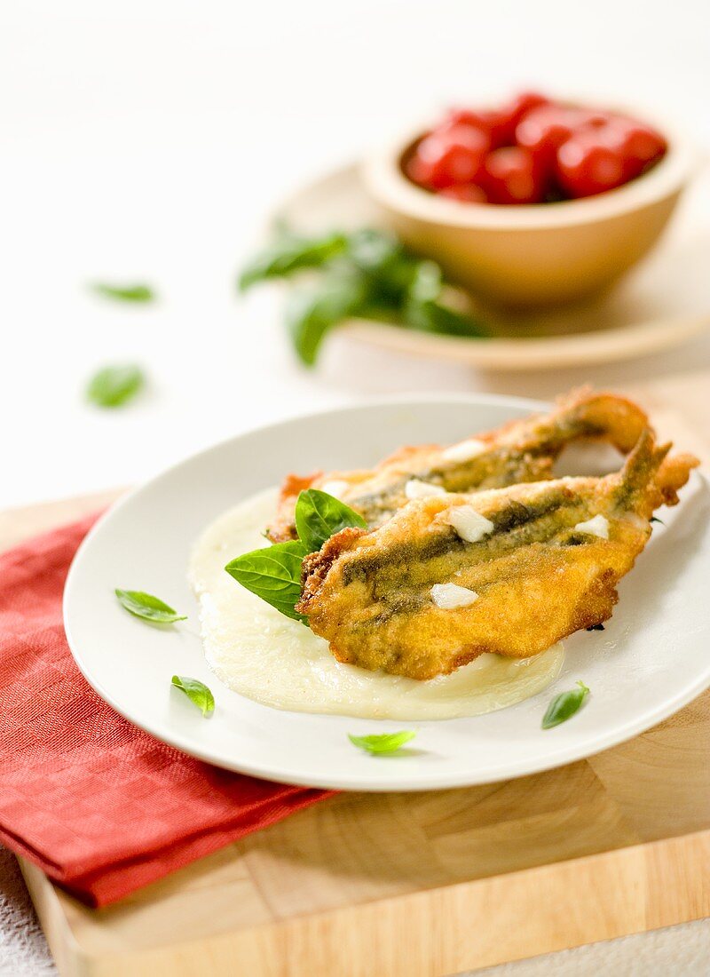 Deep-fried anchovies on mozzarella