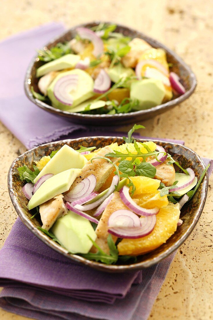 Chicken, avocado and orange salad with rocket and mint