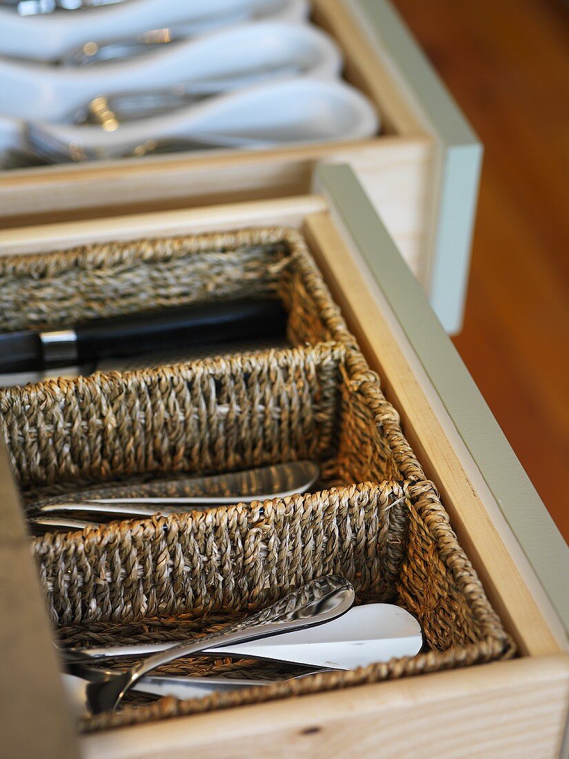 Opened cutlery drawers
