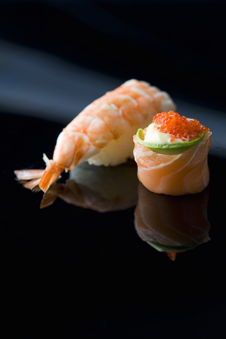 Sushi on reflective surface