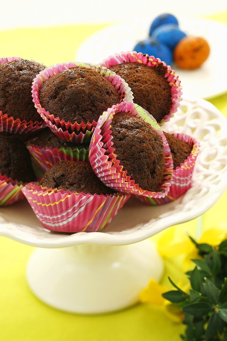 Chocolate muffins in coloured paper cases