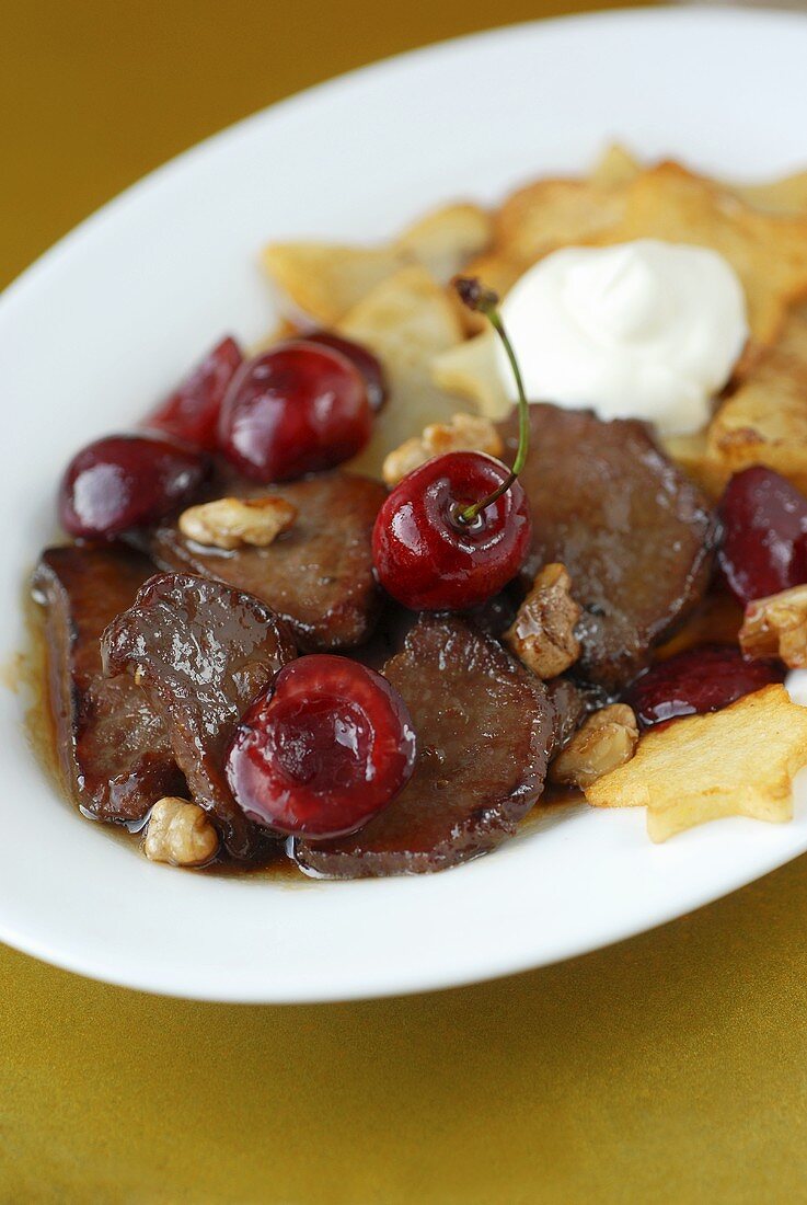 Venison ragout with cherries and nuts