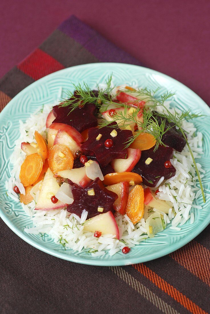 Beetroot, carrots and apples on rice