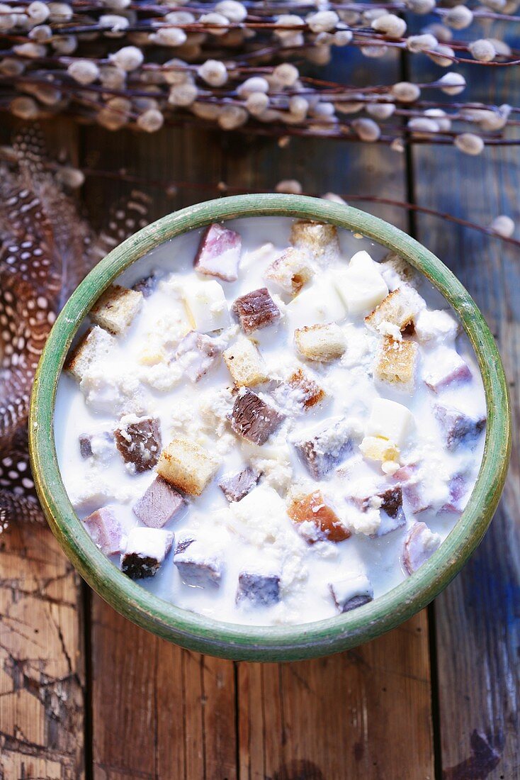Milk soup with meat and croutons