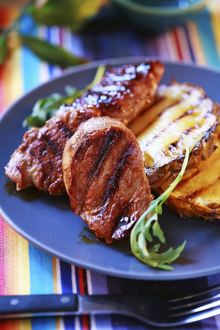 Grilled sirloin steak in honey & mustard marinade with pineapple