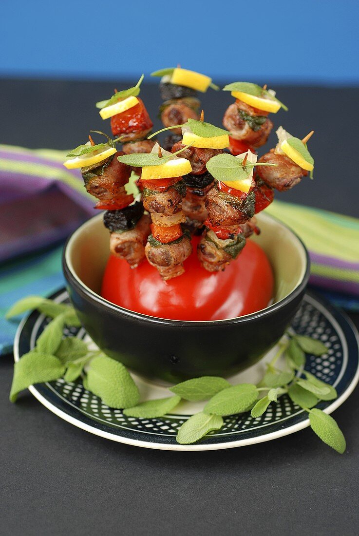 Grilled mixed kebabs, stuck into a pepper