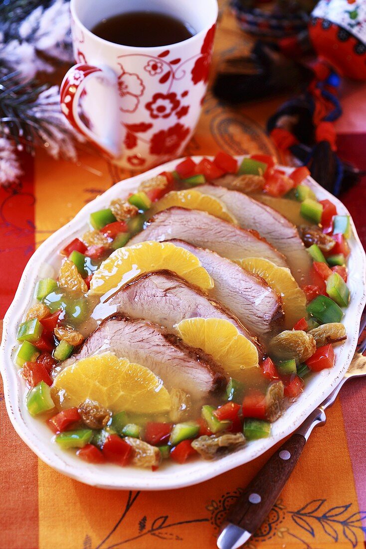 Roast pork with orange jelly and peppers (Christmas)