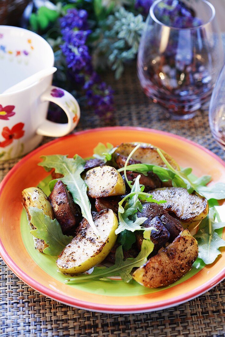 Fried liver with potatoes and rocket