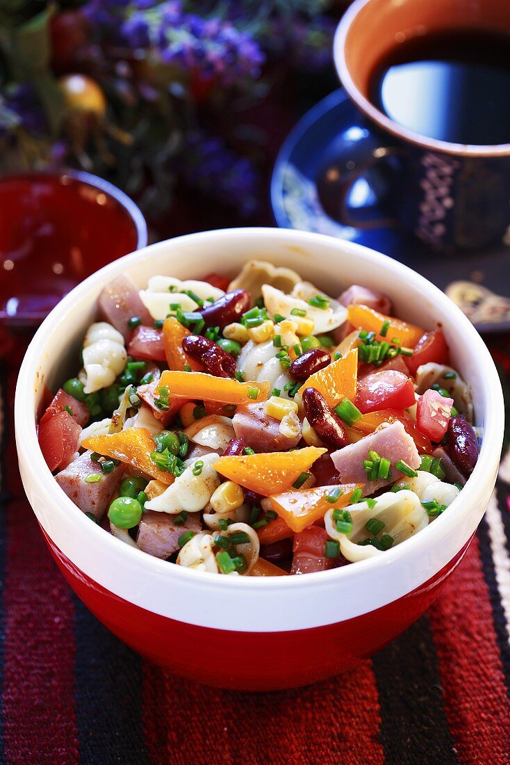Vegetable, ham and pasta salad with chives