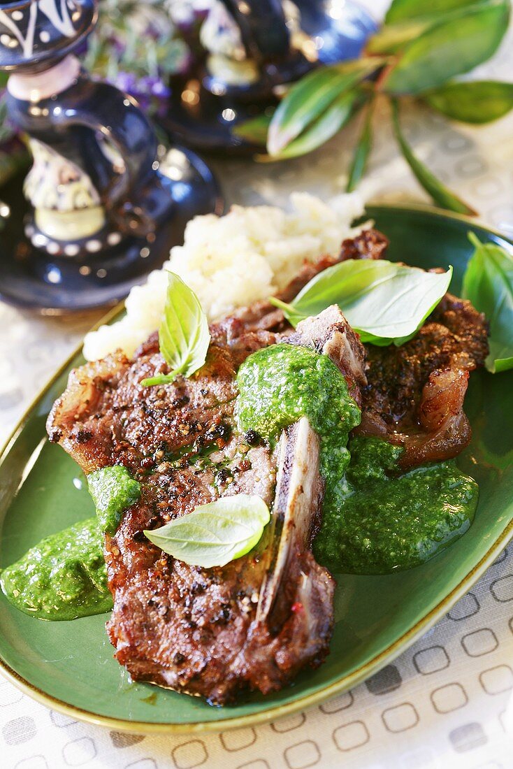 Steaks with spinach pesto and mashed potato