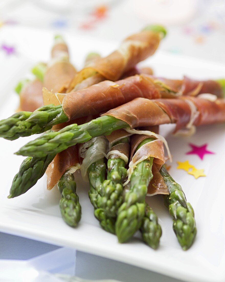Asparagus spears wrapped in Parma ham