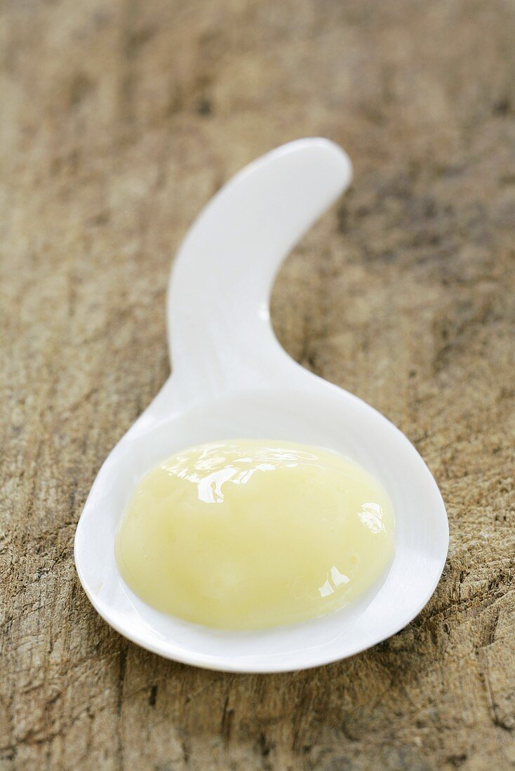 Royal jelly on spoon