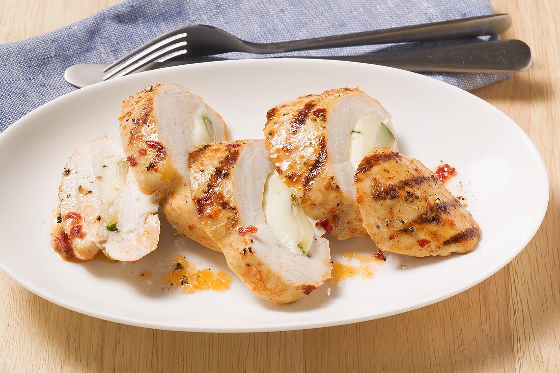 Chicken breast with mozzarella and courgettes, sliced