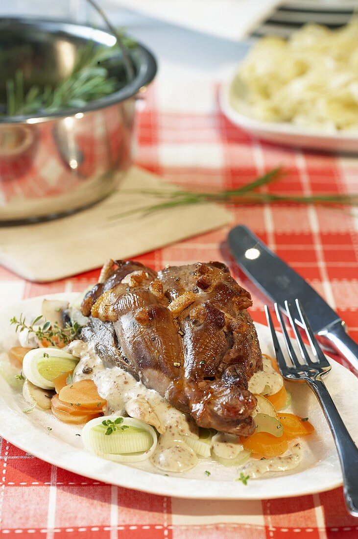 Roast hare with carrots and leeks