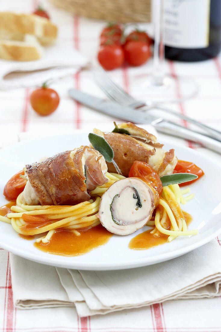 Saltimbocca roulades with spaghetti and tomato sauce