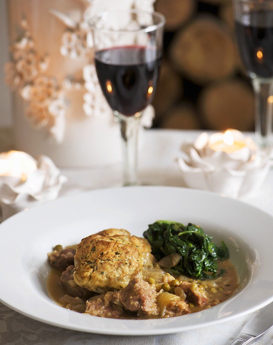 Lamb ragout with spinach and cheese scone