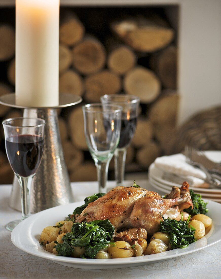 Roast chicken with potatoes and spinach