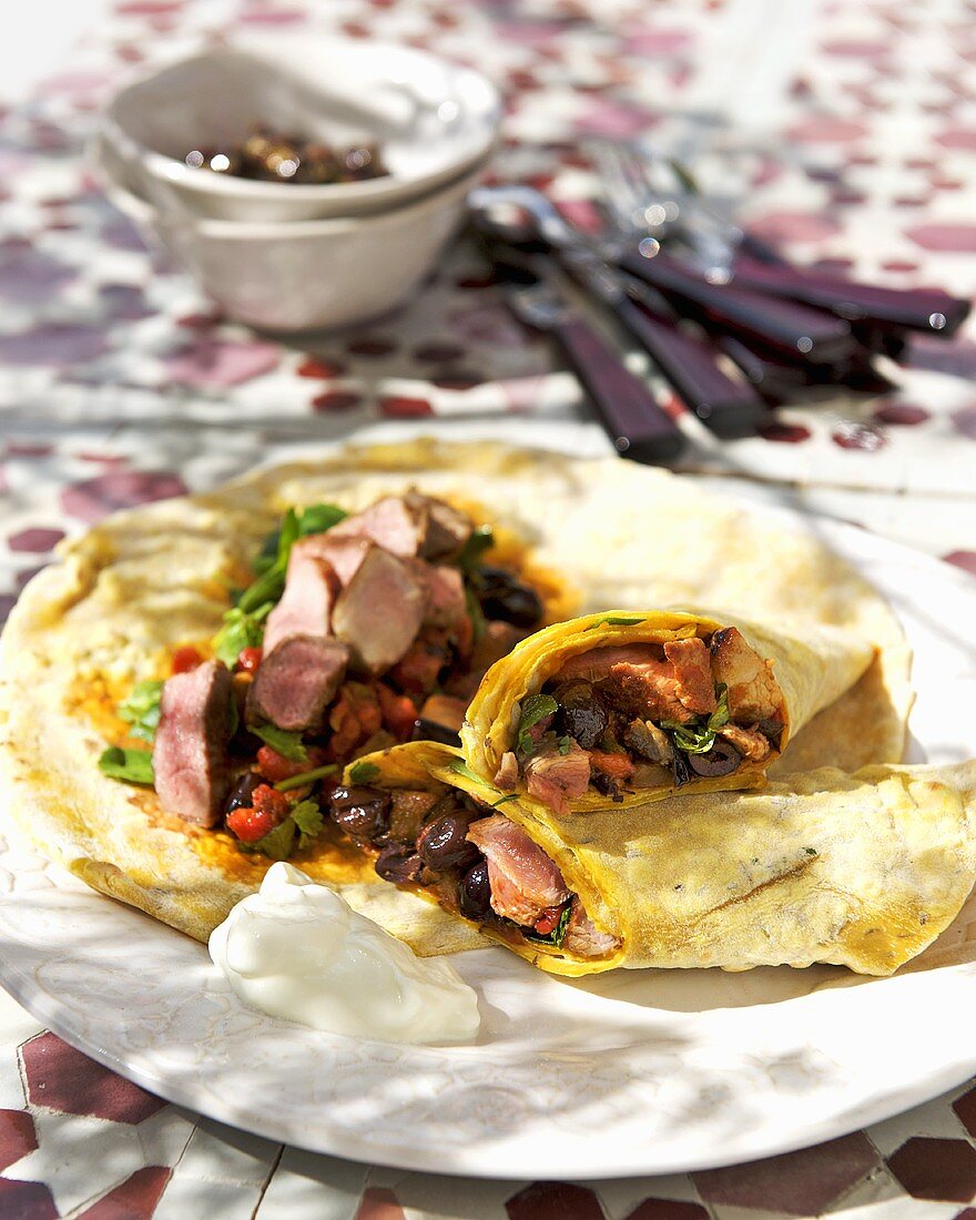 Moroccan flatbread wraps with lamb and harissa filling