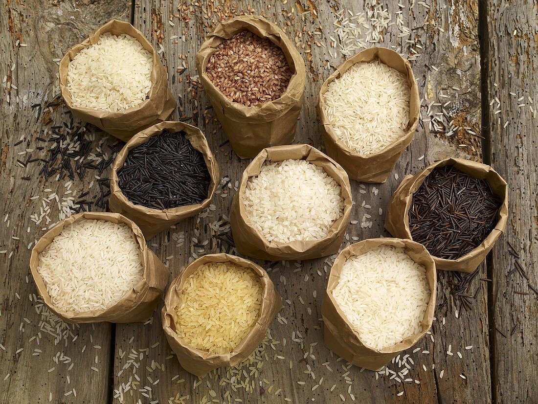 Various types of rice in paper bags