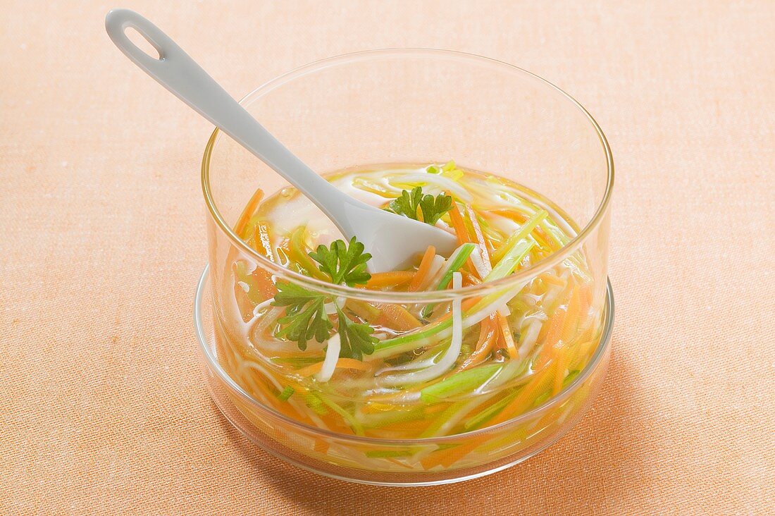 Clear broth with julienne vegetables